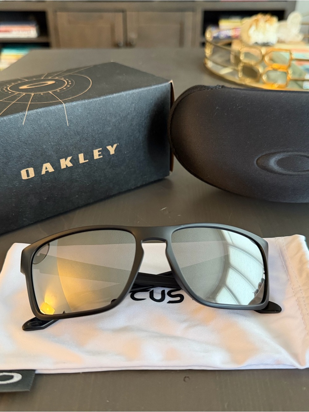 Oakley Matte Black Sunglasses with Silver and Gold Mirrored Lenses
